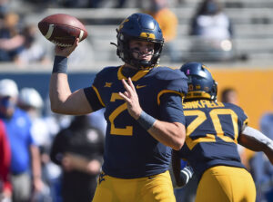 West Virginia quarterback Jarret Doege gets ready to head back home for game vs. Texas Tech